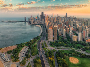 High angle view of cityscape against sky during sunset