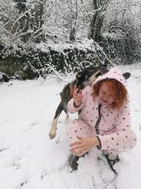 Happy girl playing with umbrella