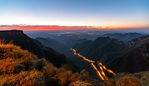 Scenic view of mountains against sky during sunset