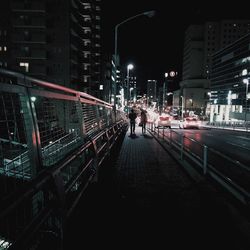 View of illuminated city at night