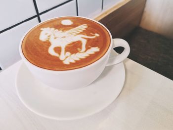 Cup of coffee on table