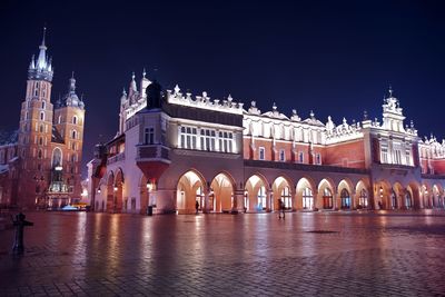 Illuminated cathedral against sky at night