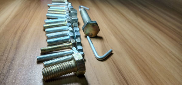 High angle view of piano on wooden table