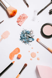 High angle view of various paint on table