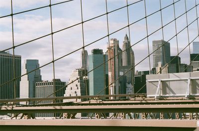 Modern buildings in city against sky