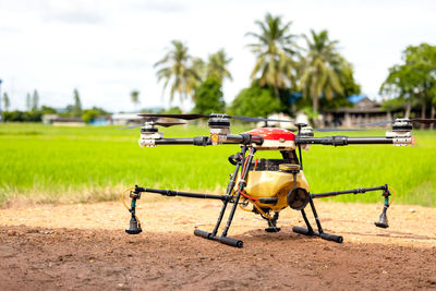 Agriculture drones fly over rice fields sprinkling fertilizer, high-resolution photographs