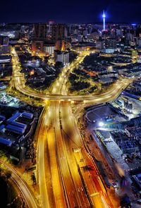 High angle view of illuminated cityscape at night