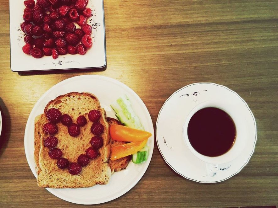 food and drink, freshness, food, indoors, table, sweet food, still life, ready-to-eat, plate, dessert, indulgence, breakfast, refreshment, drink, coffee cup, unhealthy eating, high angle view, coffee - drink, directly above, cake