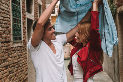 Young couple standing outdoors