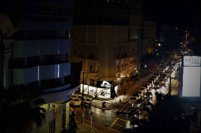 High angle view of illuminated buildings at night