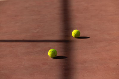 Close-up of tennis ball on court