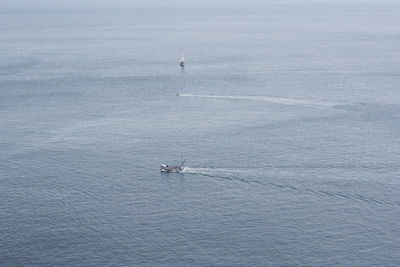 High angle view of ship sailing on sea