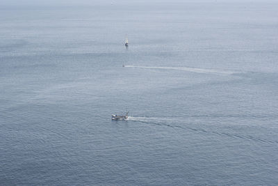 High angle view of ship sailing on sea