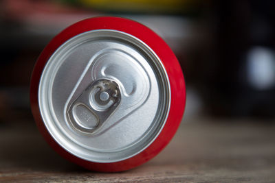 Close-up of drink can on table