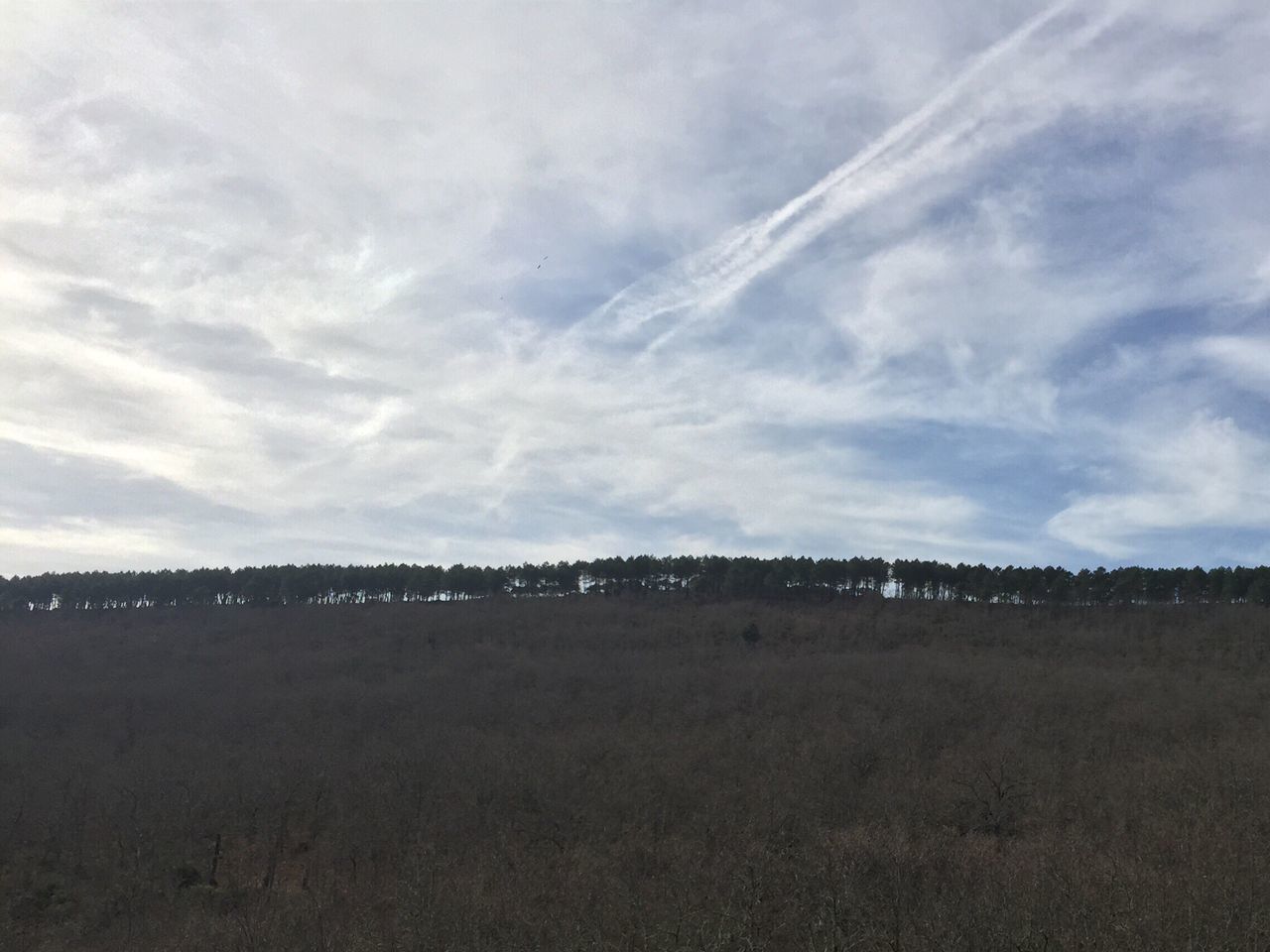 sky, landscape, cloud - sky, tranquil scene, tranquility, scenics, field, cloudy, beauty in nature, nature, cloud, horizon over land, non-urban scene, rural scene, day, remote, weather, outdoors, idyllic, mountain