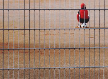 Boy standing against wall