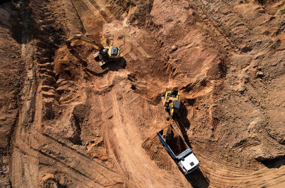 High angle view of people on rock