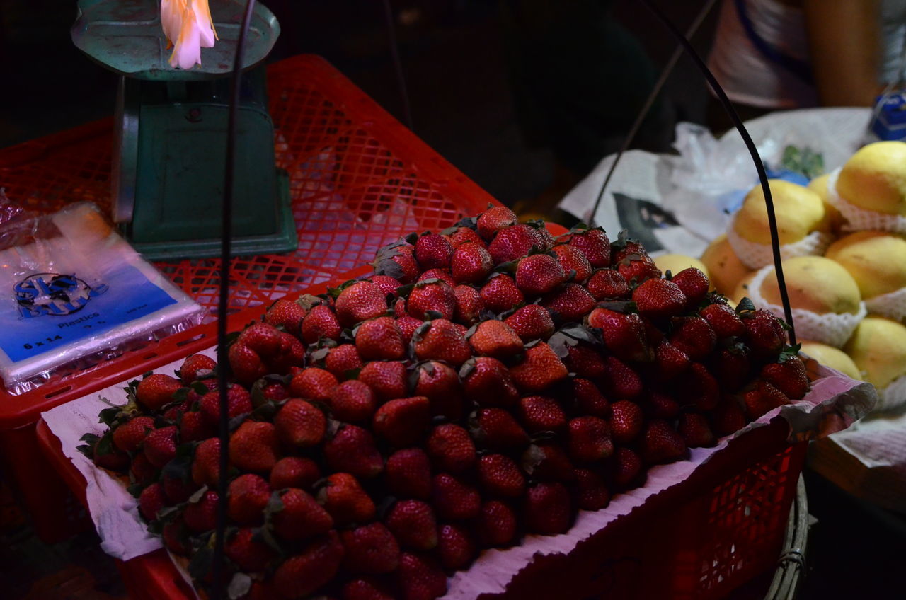 CLOSE-UP OF FRUITS FOR SALE AT MARKET STALL