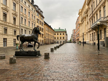 View of a street amidst buildings in city