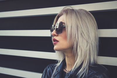 Portrait of woman wearing sunglasses