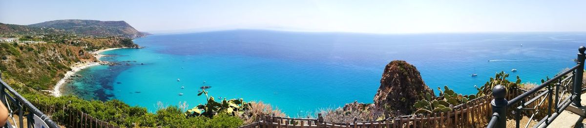 High angle view of sea against blue sky