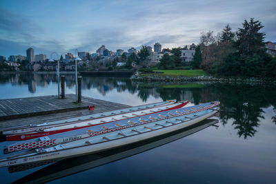 Reflection of built structures in calm lake