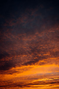 Scenic view of dramatic sky during sunset