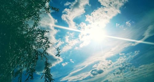 Sun shining through clouds