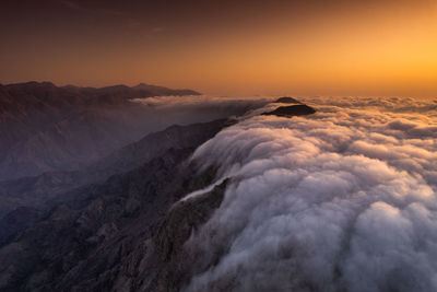 Scenic view of mountains against sky during sunset