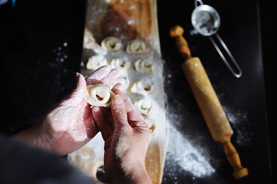 High angle view of person preparing food