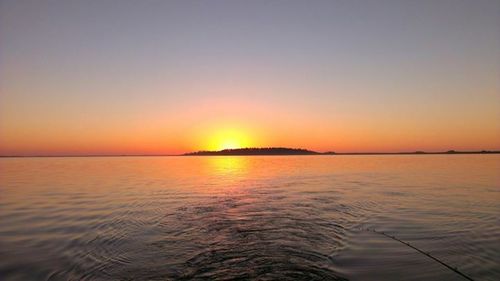 Scenic view of sunset over river