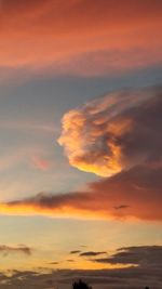 Low angle view of cloudy sky during sunset