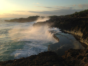 Scenic view of sea against sky during sunset