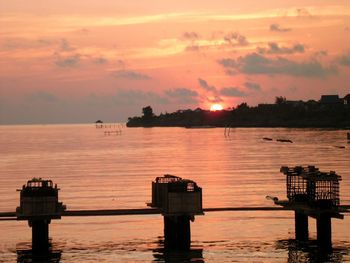 Scenic view of sunset over river