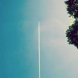 Low angle view of building against blue sky