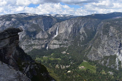 Scenic view of landscape and mountains against sky