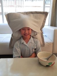 Portrait of smiling boy at home