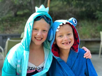 Portrait of smiling siblings