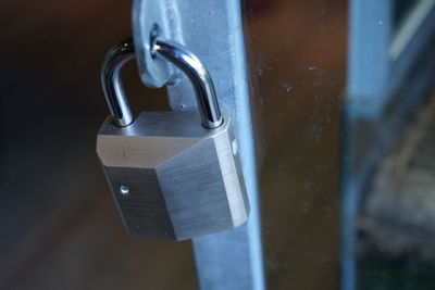 Close-up of padlock on door