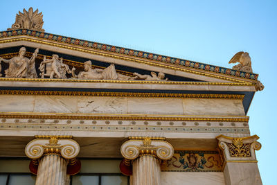 Low angle view of statue against sky