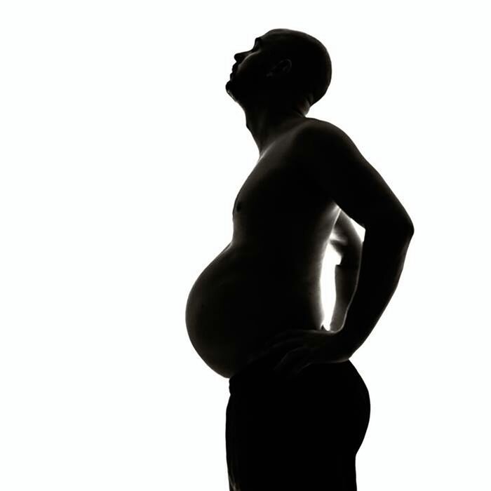 LOW ANGLE VIEW OF WOMAN ON WHITE BACKGROUND