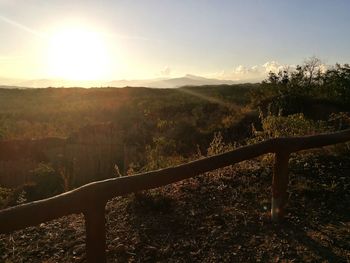 Scenic view of landscape against sky during sunset