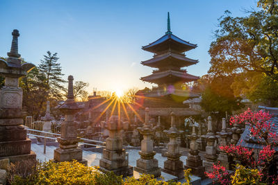 Back lit pagoda at kosho-ji temple against sky