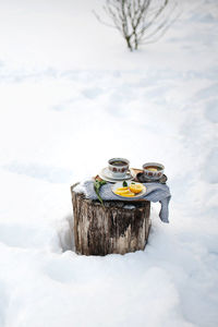 High angle view of figurines on snow