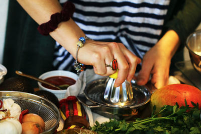 Close-up of man preparing food