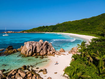 Scenic view of sea against clear blue sky