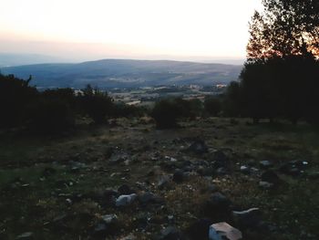 Scenic view of landscape against sky during sunset