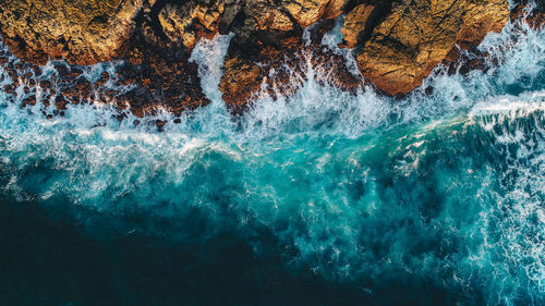 View of rock formation in sea