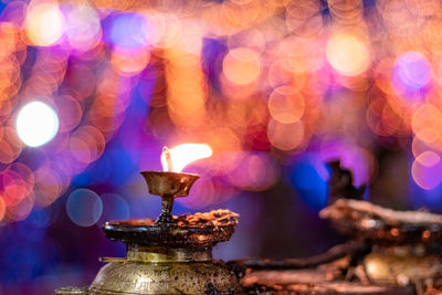 Close-up of lit diya