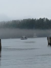 Scenic view of sea against sky during winter